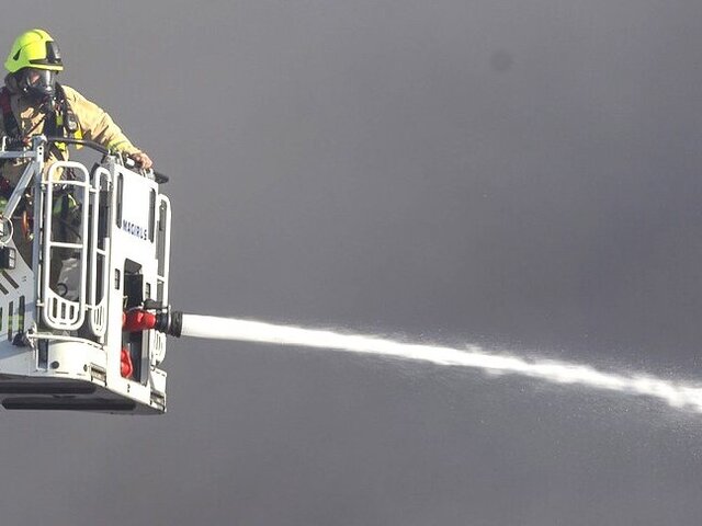 Fireman on crane