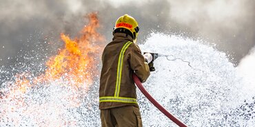 Fireman fighting fire